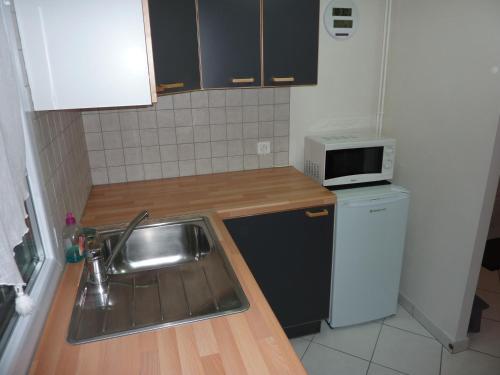 Cucina o angolo cottura di Chambre d'hôtes de Florence