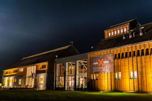 a building with a star on the front of it at Rožmalas in Ceraukste