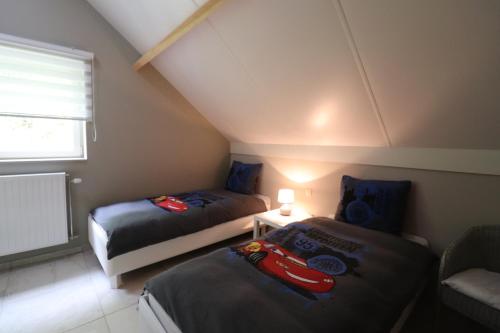 Ένα ή περισσότερα κρεβάτια σε δωμάτιο στο Stefjes Holiday Home