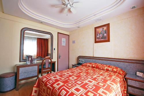 Postelja oz. postelje v sobi nastanitve Hotel Azores