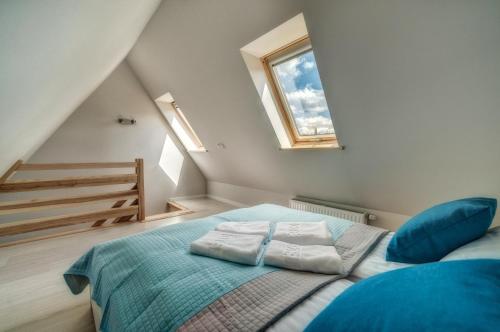 Postel nebo postele na pokoji v ubytování Apartamenty Pod Gubałówką