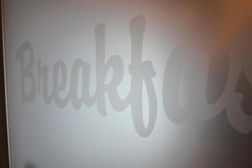 a sign with the word brooklyn on a wall at Al Sa di Te in Udine