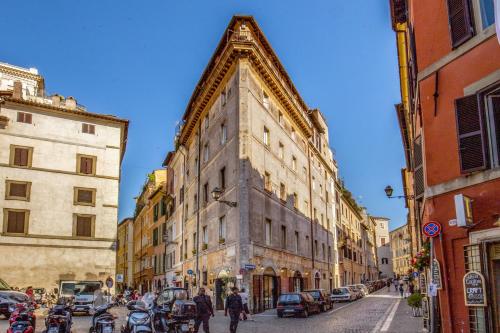 an old building on a street in a city at MyTALE Apartment Luxury Navona in Rome