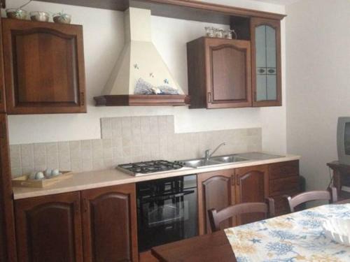 Η κουζίνα ή μικρή κουζίνα στο Appartamenti Affittacamere Villa Striari