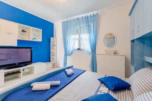 Posteľ alebo postele v izbe v ubytovaní Apartment Nazor
