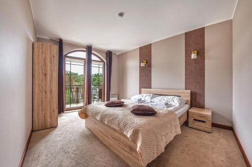 Postel nebo postele na pokoji v ubytování Continental, Sun & Snow