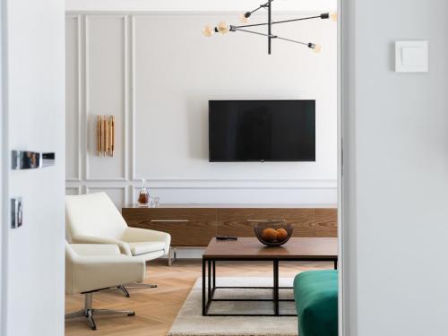 Μια τηλεόραση ή/και κέντρο ψυχαγωγίας στο Ataner Apartamenty