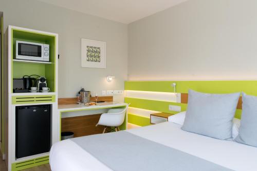 Ένα ή περισσότερα κρεβάτια σε δωμάτιο στο Vanilla Garden Boutique Hotel - Adults Only