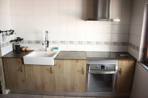 Kuchyň nebo kuchyňský kout v ubytování Casa Rural El Palatino