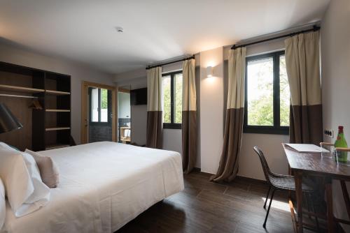 Postel nebo postele na pokoji v ubytování Hotel Rural Sagarlore