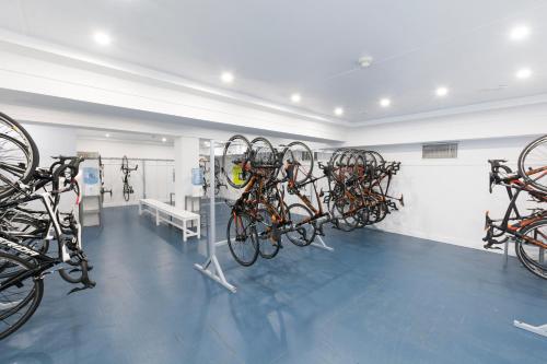 a room with many bikes parked in a room at HSM Golden Playa in Playa de Palma
