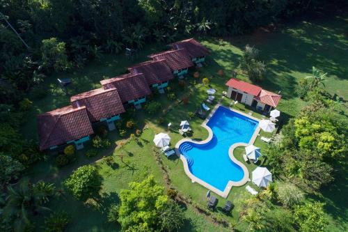 an aerial view of a resort with a swimming pool at Hacienda Baru in Dominical