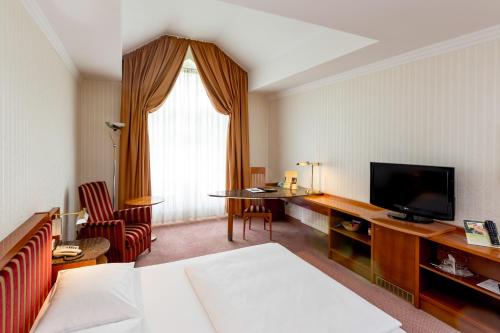 TV o dispositivi per l'intrattenimento presso Dorint Herrenkrug Parkhotel Magdeburg