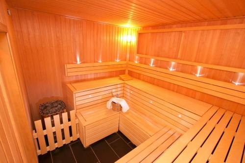 an inside view of a wooden sauna at Gasthof Spengerwirt in Hirschegg Rein