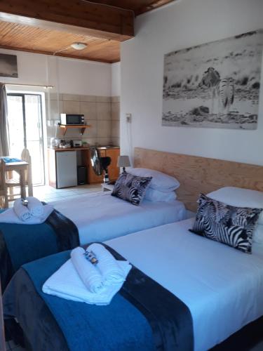 Ένα ή περισσότερα κρεβάτια σε δωμάτιο στο The Bay Inn