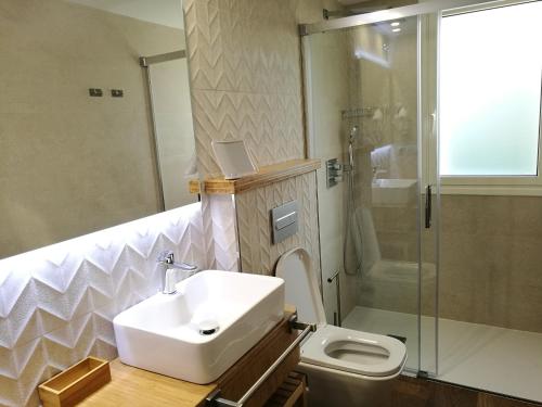Koupelna v ubytování Apartamentos La Encina