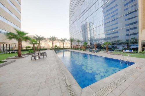 a swimming pool in the middle of a building at Makkah Al Aziziah in Makkah