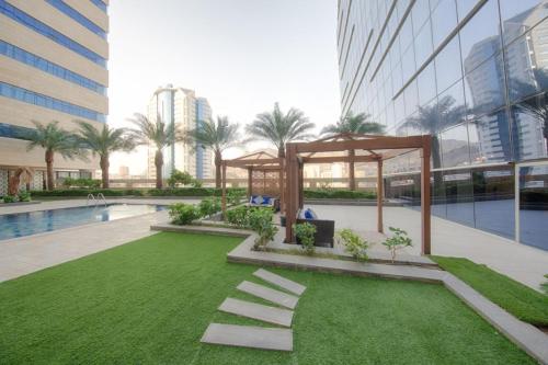 a garden with a gazebo in a building at Makkah Al Aziziah in Makkah