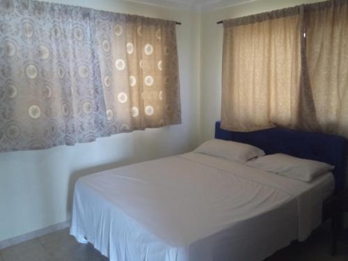Postel nebo postele na pokoji v ubytování Residencial El Mirador