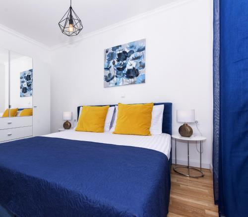 Giường trong phòng chung tại Petra's Place - Sea view apartment