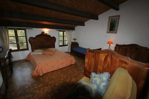 Кровать или кровати в номере Maison d'Hôtes de Charme de Croccano