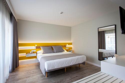 Ένα ή περισσότερα κρεβάτια σε δωμάτιο στο Vanilla Garden Boutique Hotel - Adults Only