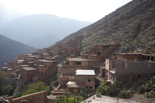 a village on the side of a mountain at Berber Family Lodge in Imlil