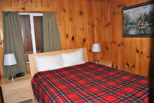 Katil atau katil-katil dalam bilik di Edelweiss Lodge