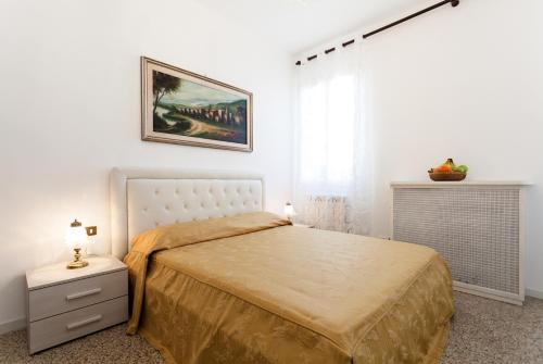 Postel nebo postele na pokoji v ubytování Prince Apartments