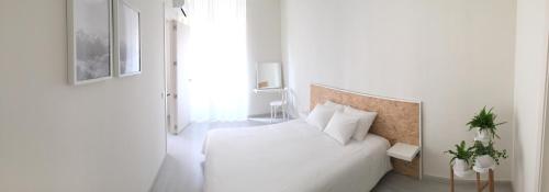 Amplio y luminoso apartamento con vistasにあるベッド