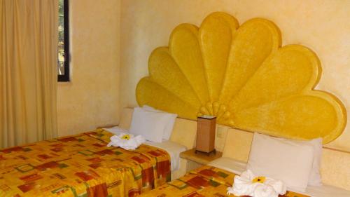 Cama o camas de una habitación en Villas La Lupita