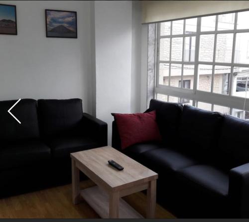 a living room with a couch and a coffee table at Santa catalina 46 in Finisterre