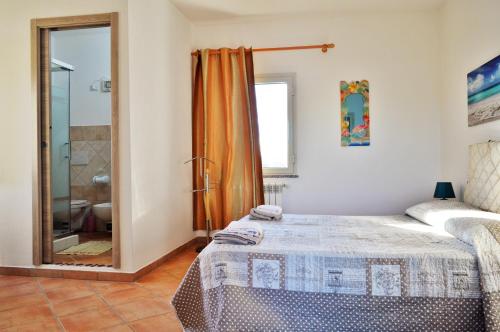 Katil atau katil-katil dalam bilik di Sardegna Mer et Soleil in Olbia