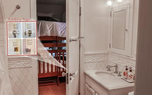 a white bathroom with a sink and a mirror at The Patrician Hollywood Universal in Pasadena