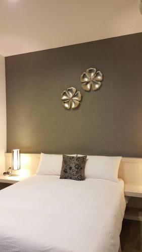 Una cama o camas en una habitación de Hao Yang I
