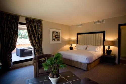 Postel nebo postele na pokoji v ubytování Le Daya Hotel & Spa - Boutique Hotel