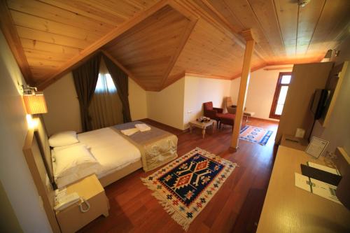 Postel nebo postele na pokoji v ubytování Iksir Resort Town