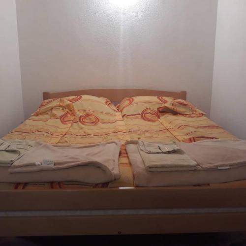 Postel nebo postele na pokoji v ubytování Apartmani Sastavci