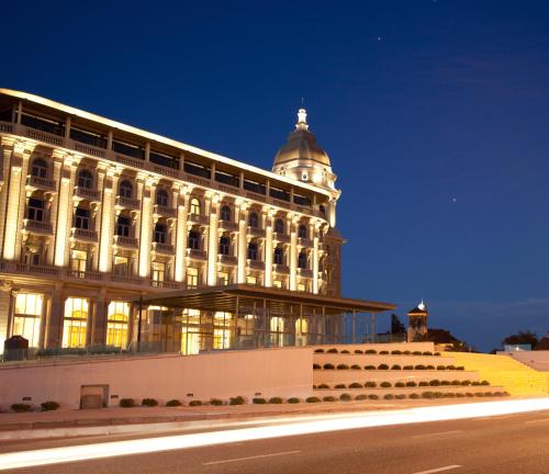 a large building with a dome on top of it at Sofitel Montevideo Casino Carrasco & Spa in Montevideo