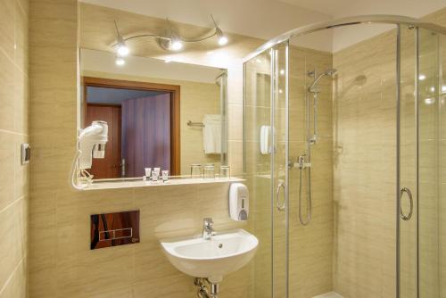 Kúpeľňa v ubytovaní Hotel Krakus