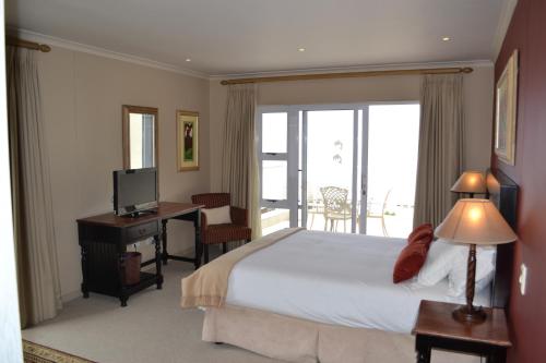 Säng eller sängar i ett rum på Pinnacle Point - Golf Safari SA