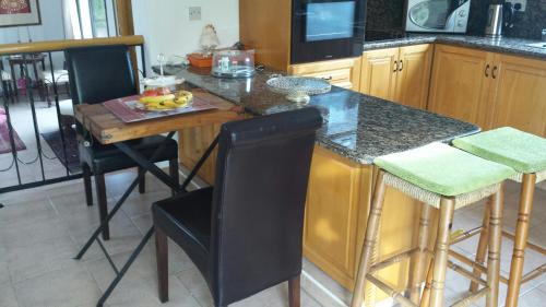 Kuchyň nebo kuchyňský kout v ubytování Residence L' Aubrais