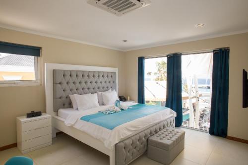 Postel nebo postele na pokoji v ubytování Hotel Islander Bonaire