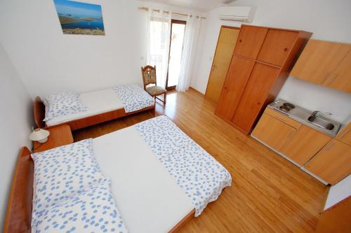 Postel nebo postele na pokoji v ubytování Pansion Marta