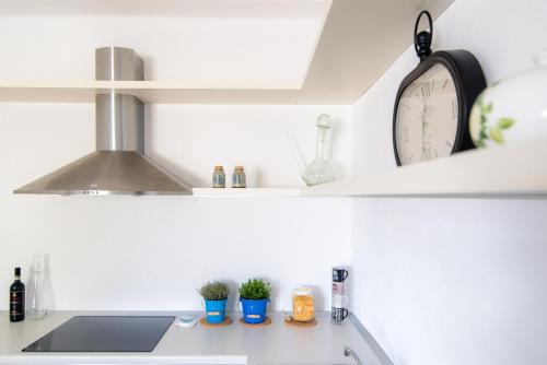 Una cocina o cocineta en Al Pontile - The House Of Travelers