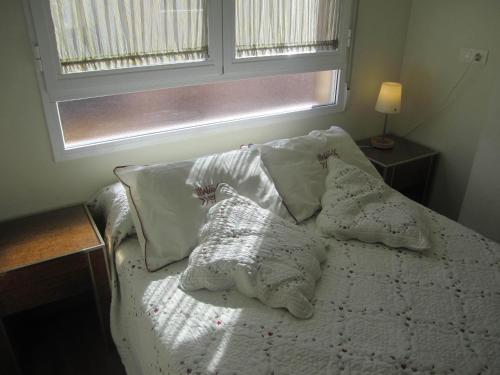 Hostal El Estudioにあるベッド