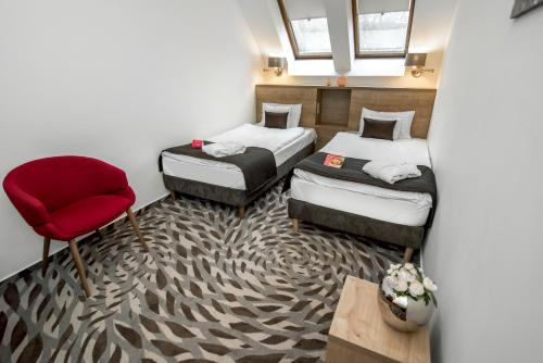 Letto o letti in una camera di Rubin Wellness & Conference Hotel