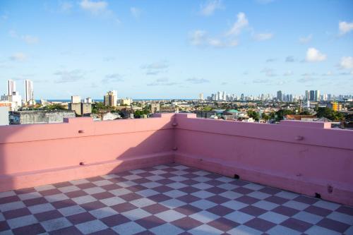 a view of a city from the roof of a building at Hotel Central in Recife