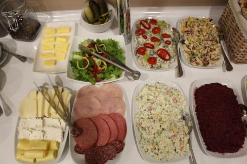 a table full of different types of food at Boutique Hotel 32 in Batumi