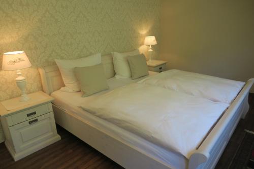 Ein Bett oder Betten in einem Zimmer der Unterkunft Ferienhaus Mosel